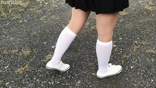 Schoolgirl in White Knee Socks and White Shoes Show under Skirt Feet