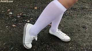 Schoolgirl in White Knee Socks and White Shoes Show under Skirt Feet