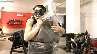 Mistress Gaia bound and bagged on the chair