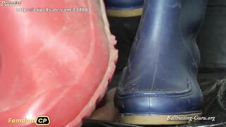 Extreme Ball Stomping and Trampling with abused red and blue rubber boots on cock board