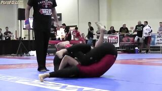 BJJ girl. Submission by triangle choke