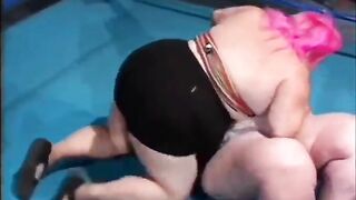 Topless hogs and a midget almost collapse the wrestling ring under their weight