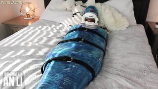 Mistress An Li tramples and punches mummified slave in balls