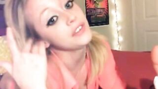 Webcam girl sucks a dildo