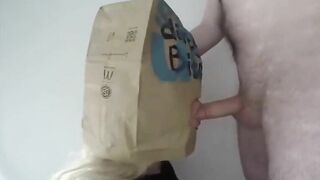 Dirty German girl blowjob with a McDonalds Paper Bag on head
