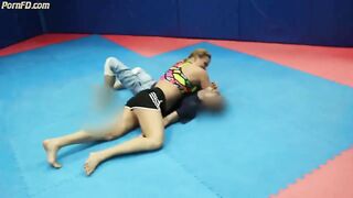 Strong nice fitness girl vs man headscissor wrestling