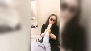 Mistress and her foot slave in public