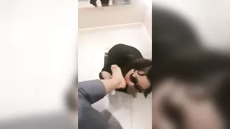 Mistress and her foot slave in public